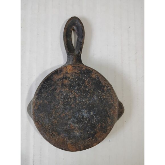 John Wright Miniature Cast Iron Skillet Amish Girl Walking - Picture 1 of 2